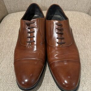 Kenneth Cole men’s size 9.5 leather dress shoes.